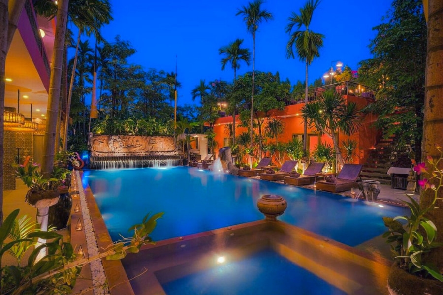 Luxury hotel swimming pool at night in Siem Reap Cambodia – Auasia Travel
